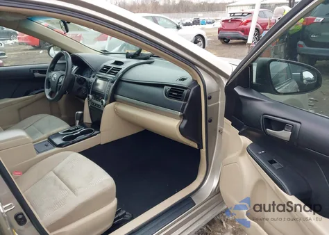 2014 Toyota Camry Le z USA, uszkodzony, nr VIN 4T4BF1FKXER407752